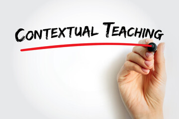 Text Contextual Teaching written with marker and underlined in red by a hand, concept for education, modern pedagogy, and experiential teaching techniques