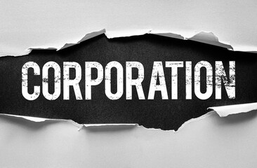 The word CORPORATION revealed beneath torn paper. A strong visual metaphor for business, strategy, or enterprise. Distressed text style emphasizes strength, structure, and organizational depth