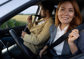 People putting on safety seatbelts