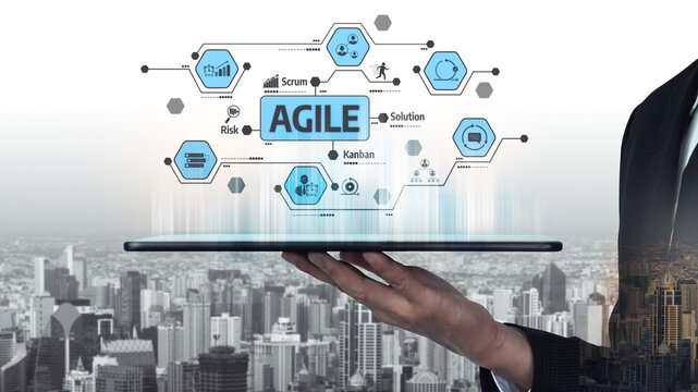A modern representation of Agile methodology, displaying various digital icons on a tablet against an urban backdrop, symbolizing innovation and effective project management. Tessel - Powered by Adobe