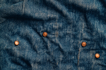 Worn denim fabric texture close up