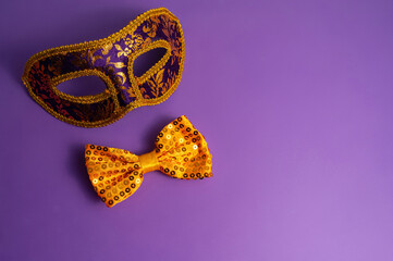 Vibrant Mardi Gras background with mask, beads, and festive decorations