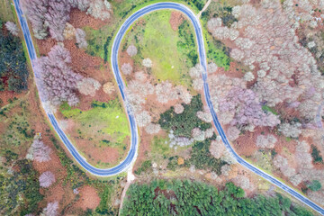 Drone shot of a mountain pass road in winter the concept of adventure and travel