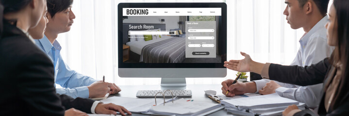 Business intelligence and data analysis concept. Analyst team working on financial data analysis dashboard on laptop screen as marketing indication for effective business strategic planning. Insight