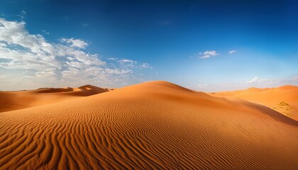 Serene Landscape Featuring Rolling Sand Dunes Under Clear Blue Sky With Fluffy White Clouds Warm Tones Of Desert Create Tranquil Atmosphere