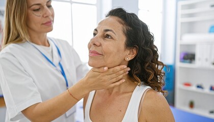 Healthcare professional conducting a thorough neck examination on a female patient in a bright medical office, focusing on wellness and early detection