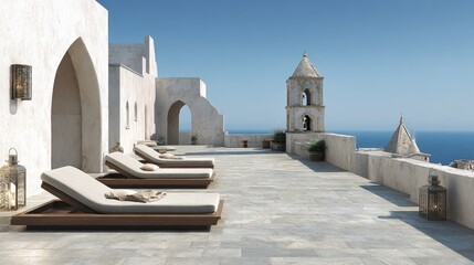 Elegant rooftop lounge with sunbeds and ocean view under a clear sky