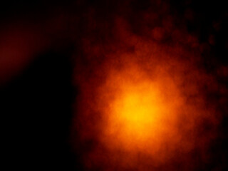 Warm orange light leaks on black background for design and special effects. Ray of light.