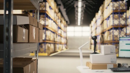 Empty fulfillment center with industrial shelving and storage racks with packages for large scale e-commerce activity. Space designed for fast delivery, product packaging and order processing.