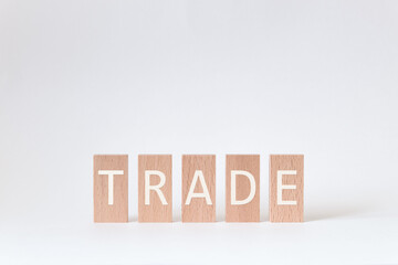 There is wood block with the word Trade. It is as an eye-catching image.