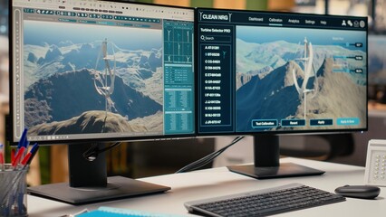 Futuristic windmill prototype simulation on PC screens in research and development office. Next generation vertical wind turbine blueprint on CAD software, sustainable technology innovation concept