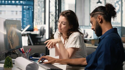 Engineer and property developer working with architectural design software, analyzing project layouts and renovation strategies for real estate expansion and urban development.