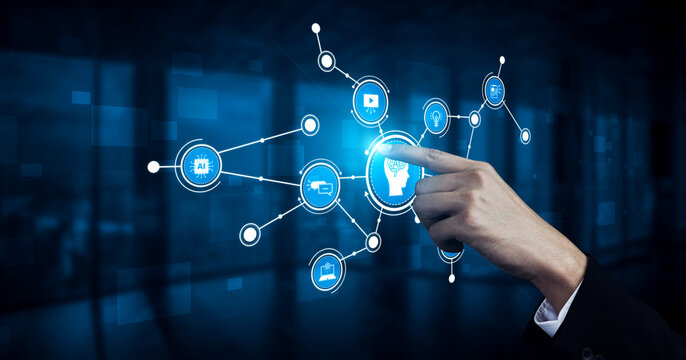 A businessman is interacting with a digital interface showcasing a network of icons representing various technologies and data points, symbolizing innovation and connectivity. Tessel - Powered by Adobe