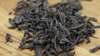 Dried black loose leaf tea close-up