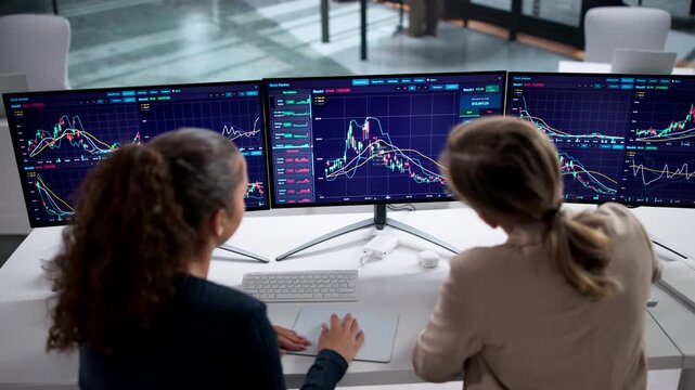 Broker Women Looking At Computer Screen