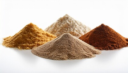 Four Textured Ingredient Piles On White Surface