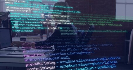 Casting translucent code overlay across open office, covering team in casual clothes using laptops