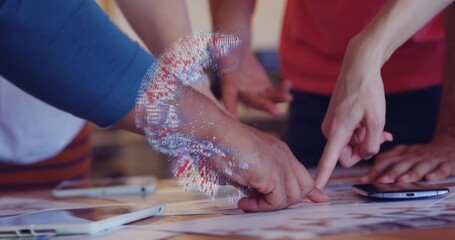 Examining hands pointing at prints on table with phones, holographic overlay, blue and red sleeves