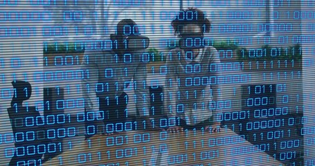 Testing pair in light shirts using VR headsets at wooden table in modern room, binary overlay