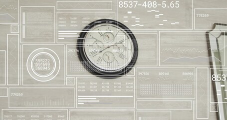 Showing dark-rimmed analog clock with subdials on wooden desk with HUD overlays and partial device