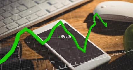 Displaying white smartphone overlapping second phone on wooden desk, with keyboard and green chart