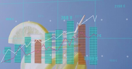 Blending tall glass and financial overlay in studio, with lemon slices, teal bars, magenta lines