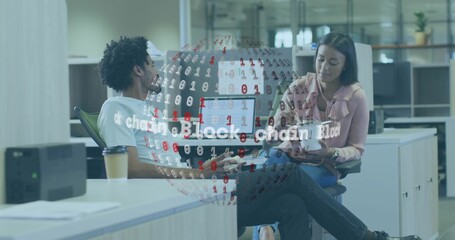 Discussing two colleagues using tablet at office, woman pink top, man light tee, block chain globe