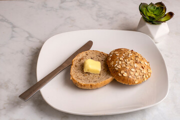 toasted multi grain bagel  with plant base  butter