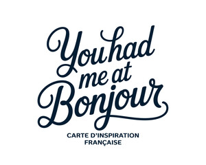 A playful French phrase on a white background with elegant black cursive text