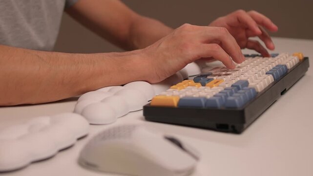 Keyboard setup showcase, Ergonomic mechanical keyboard display, Closeup of tactile switches on custom keyboard, Designer testing pastel keycaps with ergonomic wrist cushion setup