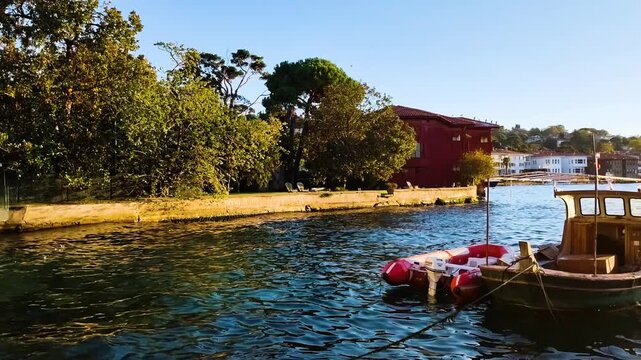 Luxury Waterfront Mansion and Boats in Beykoz Bosphorus, Istanbul at Golden Hour.