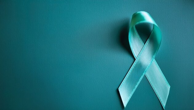 a teal ribbon on a blue surface symbolizes hope and awareness for cervical cancer encouraging community support and education