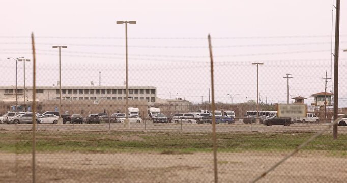 Chino, California, USA - March 1, 2025: Cloudy sun shines on the California Institution for Men State Prison Chino.