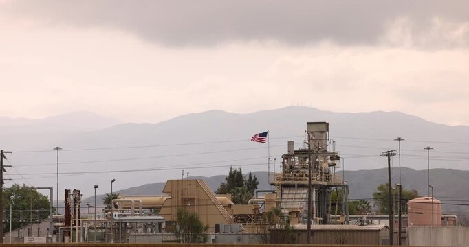 Cloudy day view of an cogeneration plant in the industrial district of Chino, California, USA.