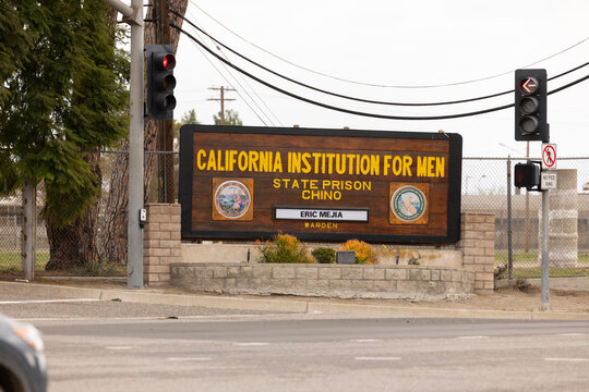 Chino, California, USA - March 1, 2025: Cloudy sun shines on the entrance for the California Institution for Men State Prision Chino.