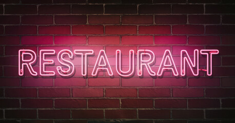 Obraz premium Neon sign spelling out the word Restaurant on a brick wall