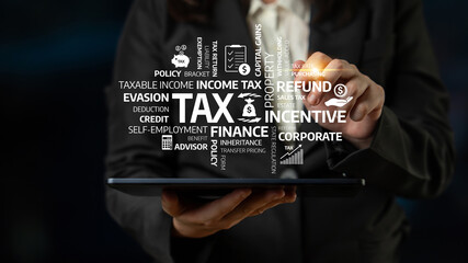 A business professional engages with key tax concepts through digital technology, showcasing the...