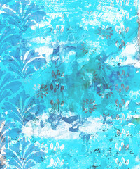 Peeling and deteriorating wallpaper and painted wall