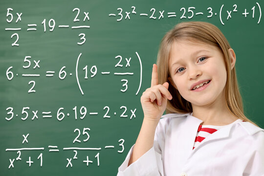 Cute little girl near green chalkboard with math formulas. Studying science - Powered by Adobe