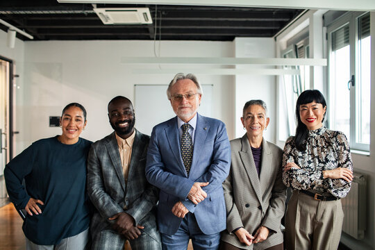 Diverse startup leadership team portrait in modern office