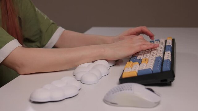 Keyboard setup showcase, Ergonomic mechanical keyboard display, Closeup of tactile switches on custom keyboard, Designer testing pastel keycaps with ergonomic wrist cushion setup