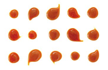 Glossy Caramel Sauce Droplets on White Background