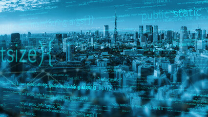 A stunning cityscape image showcasing a metropolitan skyline at night, enhanced with a digital code overlay symbolizing the intersection of technology and urban living. Xenic