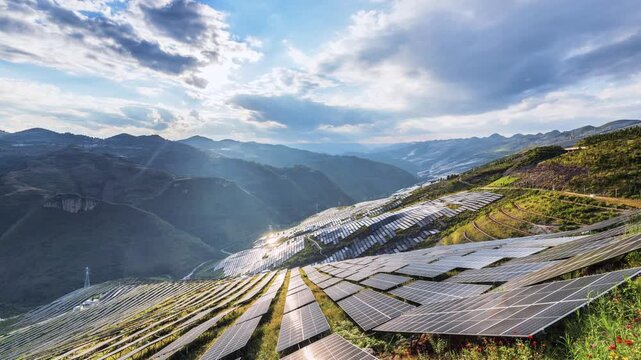 Time-lapse of a massive mountain solar farm with sunbeams piercing through clouds,  clean energy generation in harmony with nature.