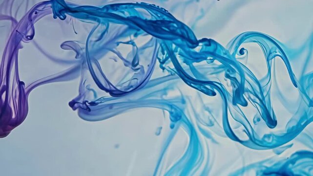 Abstract royal blue dye smoke cloud swirling on white background. Artistic watercolor fluid effect.