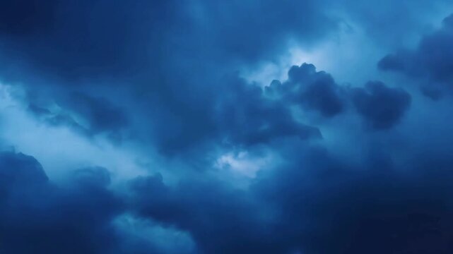 Moody billowing thunderclouds filling the sky. Dramatic weather atmosphere background animation for intense scenes.