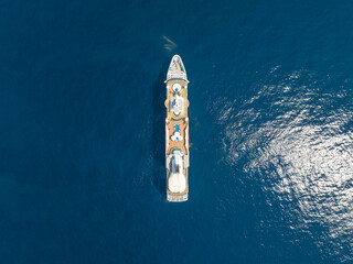 top down view of Cordelia Cruises luxury passenger ship sailing in the Arabian Sea, capturing modern cruise travel, marine transportation, vacation tourism, and Indian cruise industry.  © Akshaykanade