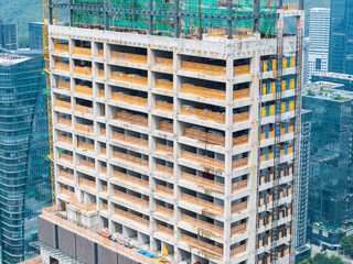 Construction of high-rise buildings in City, industrial construction site