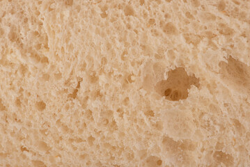 Sliced bread from the inside, macro photo as a background.