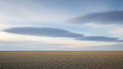 Fototapeta premium Serene Landscape, Cloud Formation, Open Field, Scenic Photography, Tranquil Environment, Wide-Angle Viewpoint